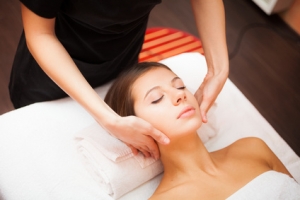 Woman enjoying a facial massage